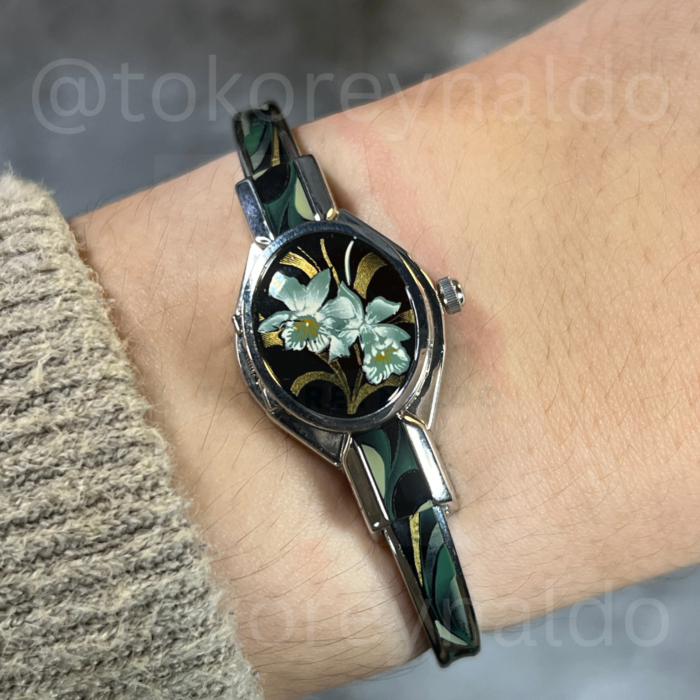 JAM TANGAN ANDRE MOUCHE ORCHIDEE BANGLE PEEK-A-BOO PDP BLACK AND GREEN ENAMEL FLORAL (LX1904)