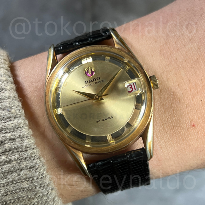 JAM TANGAN VINTAGE 1960’s RADO WORLD TRAVEL 30 JEWELS 59948 “POLEROUTER” ROUND G0LD PLATED CHAMPAGNE CONTENTRIC GUILLOCHE DIAL (LX1986)