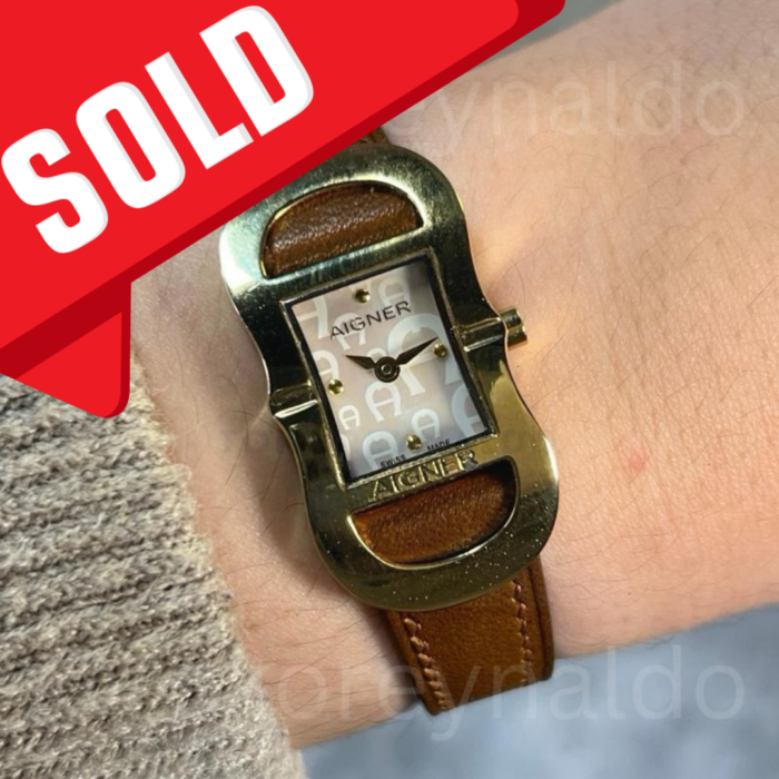 JAM TANGAN AIGNER CESENA A53200 OVAL GOLD PLATED SILVER EMBOSSED LOGO DIAL (LX1960)