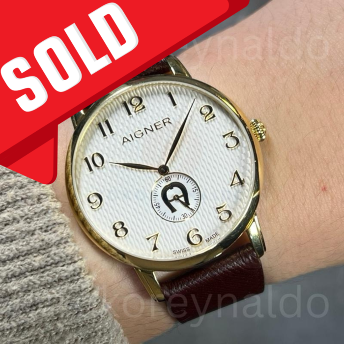 JAM TANGAN AIGNER VIAREGGIO A04100 ROUND GOLD TONE WHITE PATTERN DIAL (LX2412)